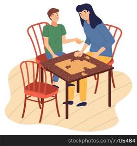 Happy family spend time at home. People connecting collecting puzzle pieces. Mother and son together at home playing table logic game. Indoors home activity, hobby. Relationships of parents and kids. Mother and son together at home playing table logic game, connecting collecting puzzle pieces