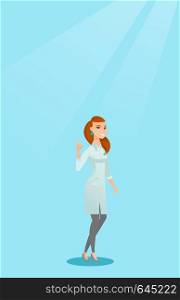 Happy female doctor in medical gown showing ok sign. Smiling doctor gesturing ok sign. Young joyful caucasian doctor with ok sign gesture. Vector flat design illustration. Vertical layout.. Doctor showing ok sign vector illustration.