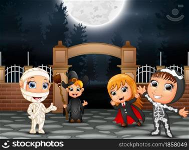 Happy Halloween party with group of children in different costume