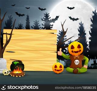 Happy kid wearing pumpkin mask costume sitting beside the wooden board