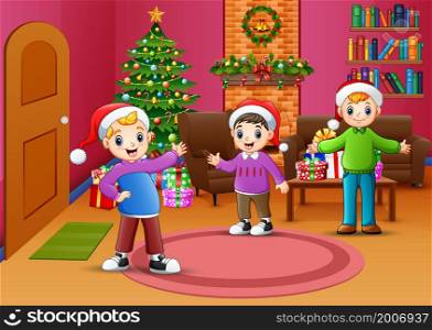 Happy kids celebration a christmas in the living room
