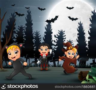 Happy kids wearing halloween costume in the night