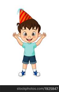 Happy little boy wearing a party hat