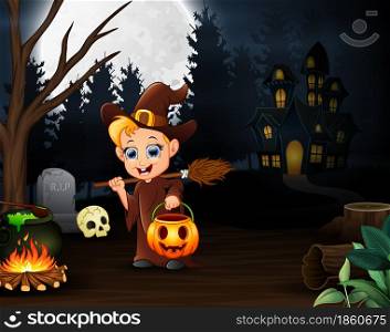 Happy little witch holding pumpkin basket in the night