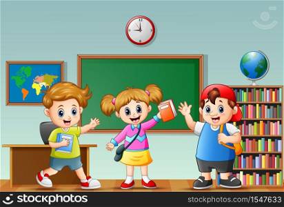 Happy school kids in a classroom