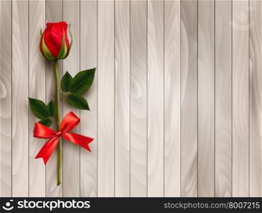 Happy Valentine&rsquo;s day. Beautiful red rose and gift bow on wooden background. Vector.