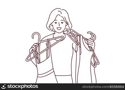 Happy young woman with dresses on hangers shopping in mall. Smiling girl buying fashion clothes in store. Style and consumerism. Vector illustration. . Smiling girl shopping in mall 