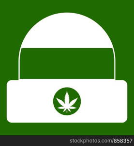 Hat with sign cannabis icon white isolated on green background. Vector illustration. Hat with sign cannabis icon green