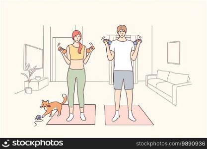 Healthy active lifestyle, training at home concept. Active young happy couple doing workout with dumbbells on fitness mats at home during quarantine pause and enjoying time together . Healthy active lifestyle, training at home concept
