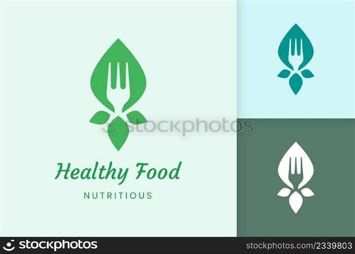 healthy food logo with fork and leaf shape