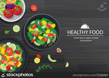 Healthy food with ingredients on the dark wooden table background.
