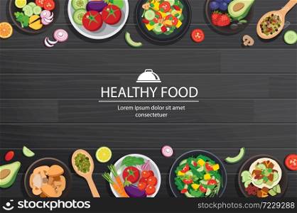 Healthy food with ingredients on the dark wooden table background.