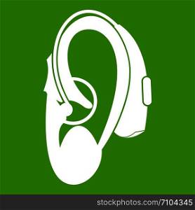 Hearing aid icon white isolated on green background. Vector illustration. Hearing aid icon green