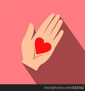 Heart in hand flat icon on a pink background. Heart in a hand flat icon