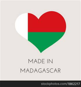 Heart shaped label with Republic of Madagascar flag. Made in Madagascar Sticker. Factory, manufacturing and production country concept. Vector stock illustration