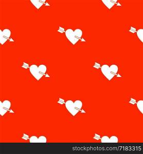 Heart with arrow pattern repeat seamless in orange color for any design. Vector geometric illustration. Heart with arrow pattern seamless