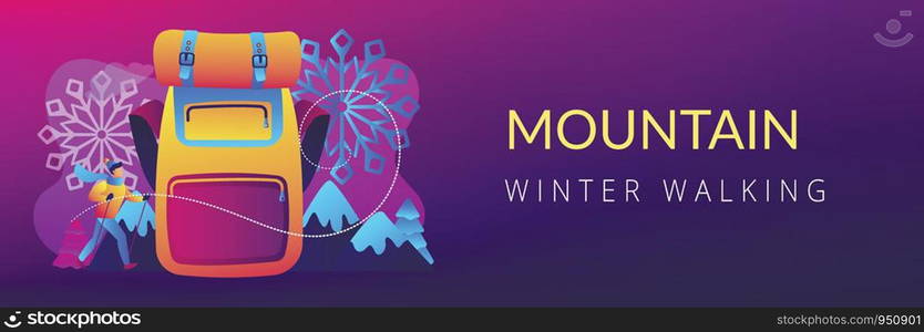 Hiker in warm clothes walking in the mountains in winter and a huge backpack. Winter hiking, hiking warm clothing, mountain winter walking concept. Header or footer banner template with copy space.. Winter hiking concept banner header.