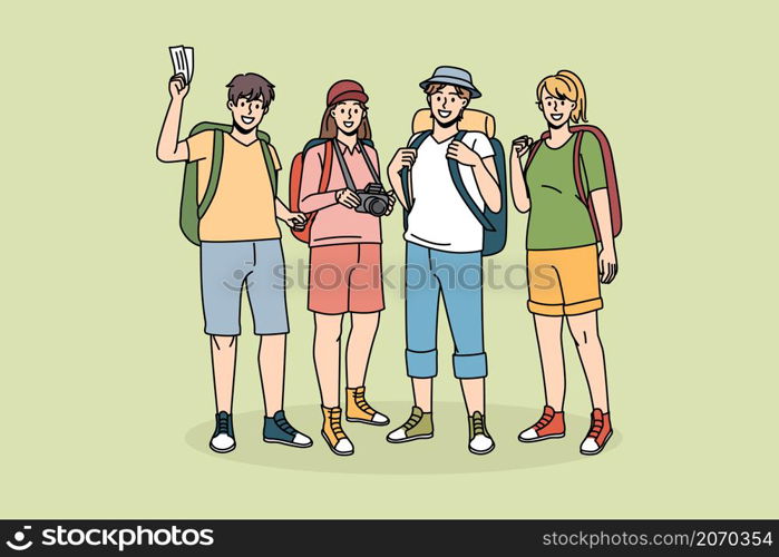 Hiking backpacking and tourism concept. Group of young smiling travelers backpackers standing with camera feeling excited with trip vector illustration . Hiking backpacking and tourism concept