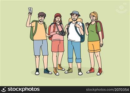 Hiking backpacking and tourism concept. Group of young smiling travelers backpackers standing with camera feeling excited with trip vector illustration . Hiking backpacking and tourism concept