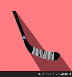 Hockey stick flat icon. Single illustration with shadow on a pink background. Hockey stick flat icon