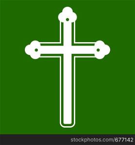 Holy cross icon white isolated on green background. Vector illustration. Holy cross icon green