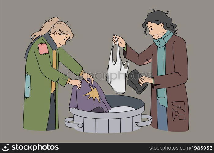 Homeless people look for clothes in trash can on streets. Poor needy