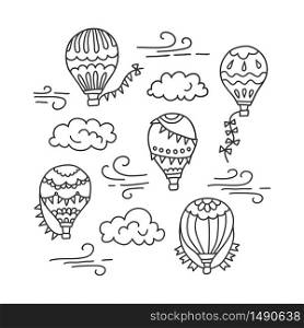 Hot air balloon and clouds. Vector hand drawn doodle illustration isolated on white background. Hot air balloon and clouds. Vector hand drawn doodle illustration
