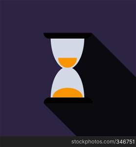 Hourglass icon in flat style on a violet background. Hourglass icon, flat style