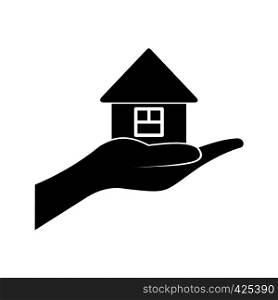 House in hand black simple icon isolated on white background. House in hand icon
