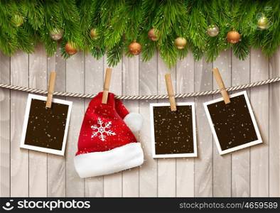 ?hristmas background with photos and a Santa hat. Vector.
