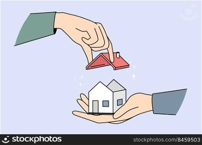 Huge hands building tiny house, set roof on building. Concept of construction. Real estate and rental. Vector illustration.. Hands building tiny house