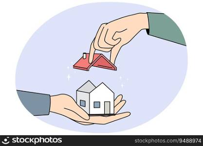 Huge hands building tiny house, set roof on building. Concept of construction. Real estate and rental. Vector illustration.. Hands building tiny house