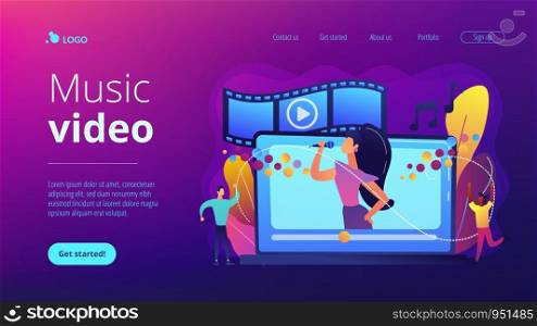 Huge laptop with famous singer performing on screen and tiny people dancing. Music video, official music video, video clip production concept. Website homepage landing web page template.. Music video concept landing page.