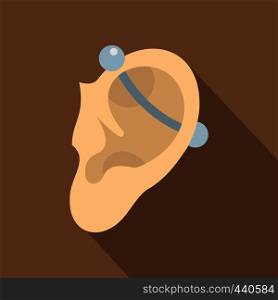 Human ear with piercing icon. Flat illustration of human ear with piercing vector icon for web on coffee background. Human ear with piercing icon, flat style