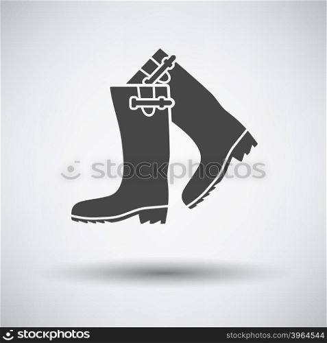 Hunter&rsquo;s rubber boots icon on gray background with round shadow. Vector illustration.