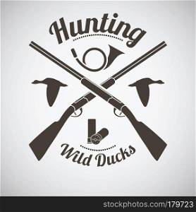 Hunting Vintage Emblem. Cross Hunting Gun With Ammo, Hunting Horn and Flying Ducks Silhouettes. Dark Brown Retro Style. Vector Illustration.