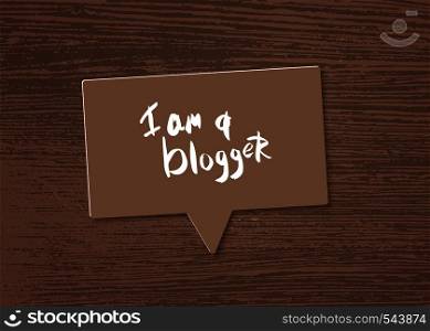 I am a blogger quote with speech bubble and wood background. Hand lettering phrase for social media networks. Vector illustration.