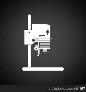 Icon of photo enlarger. Black background with white. Vector illustration.