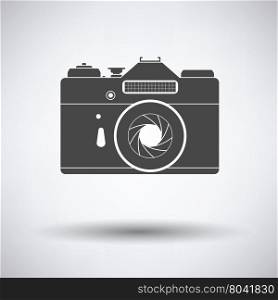Icon of retro film photo camera on gray background, round shadow. Vector illustration.