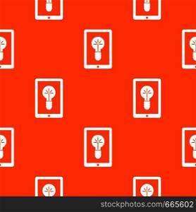 Idea lamp on gadget screen pattern repeat seamless in orange color for any design. Vector geometric illustration. Idea lamp on gadget screen pattern seamless
