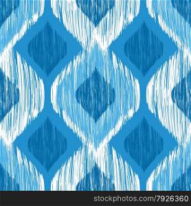 Ikat ethnic seamless pattern in blue and white colors