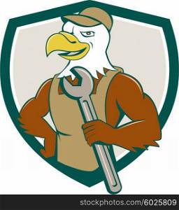Illustration of a american bald eagle mechanic holding spanner looking to the side with one hand on hips set inside shield crest done in cartoon style. . American Bald Eagle Mechanic Spanner Crest Cartoon