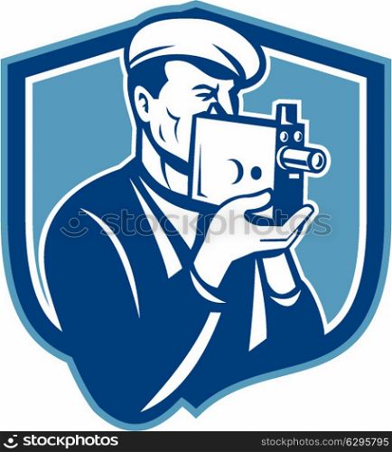 Illustration of a cameraman holding a vintage movie video camera set inside shield crest on isolated background done in retro style.. Cameraman Vintage Video Camera Shield Retro