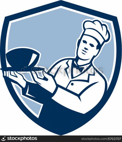 Illustration of a chef cook holding bowl serving set inside shield crest on isolated background done in retro style. . Chef Cook Holding Serving Bowl Shield Retro