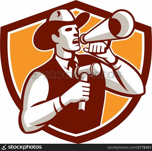 Illustration of a cowboy auctioneer holding bullhorn and gavel shouting announcing viewed from the side on isolated background set inside shield crest done in retro style.