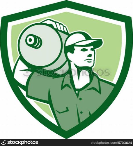 Illustration of a delivery worker holding water jug container on shoulder delivering set inside shield crest on isolated background done in retro style.. Delivery Worker Water Jug Shield Retro
