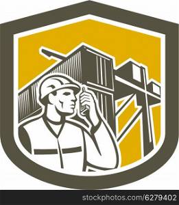 Illustration of a dock worker on phone calling with shipping containers in the background set inside shield crest done in retro style.. Dock Worker on Phone Container Yard Shield