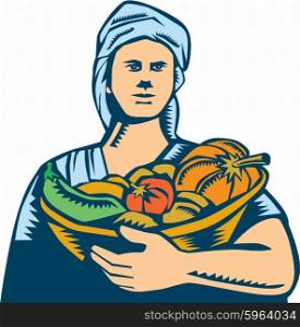 Illustration of a female lady organic farmer carrying basket full of vegetables fruits harvest produce wearing turban bandana viewed from front set on isolated white background done in retro woodcut style.