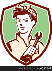 Illustration of a female mechanic holding a spanner wrench set inside shield on isolated background done in retro style.. Female Mechanic Worker Holding Spanner Retro