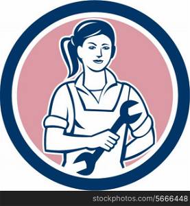 Illustration of a female mechanic holding spanner viewed from the front set inside circle on isolated background done in retro style. . Female Mechanic Spanner Circle Retro